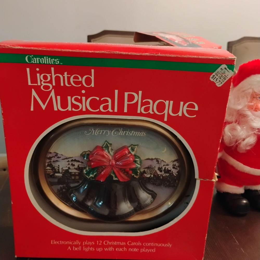 Lighted Musical‎ Plaque with Red Bow